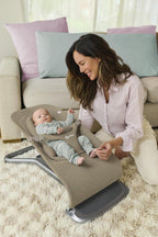 Ergobaby 3-in-1 Evolve Bouncer, Ergonomische Babywippe für Neugeborene ab Geburt bis zum Kleinkind, Babyschaukel mit Neugeboreneneinsatz (2,5 kg - 13,2 kg), Cream