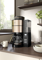 Melitta AromaFresh - Filterkaffeemaschine - mit Glaskanne - integriertes Mahlwerk - Timer Funktion - 10 Tassen - Pure Black